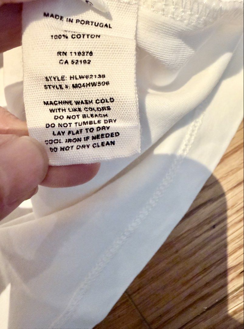 Helmut Lang Zip Sleeve T-Shirt White (Category: Shirts) located in Makati City. Submitted by beehive03 (Listing ID 1467459939, Image 3). Description: Worn once Excellent condition - Brand: Helmut Lang -Fits small to medium (tag size says XL but fits small because it’s a baby tee) - Color: Crisp White - Material: 100% Premium Cotton - Fit: Regular fit with crew neck - Details: Unique zipper accents on short sleeves - Origin: Made in Portugal - Car