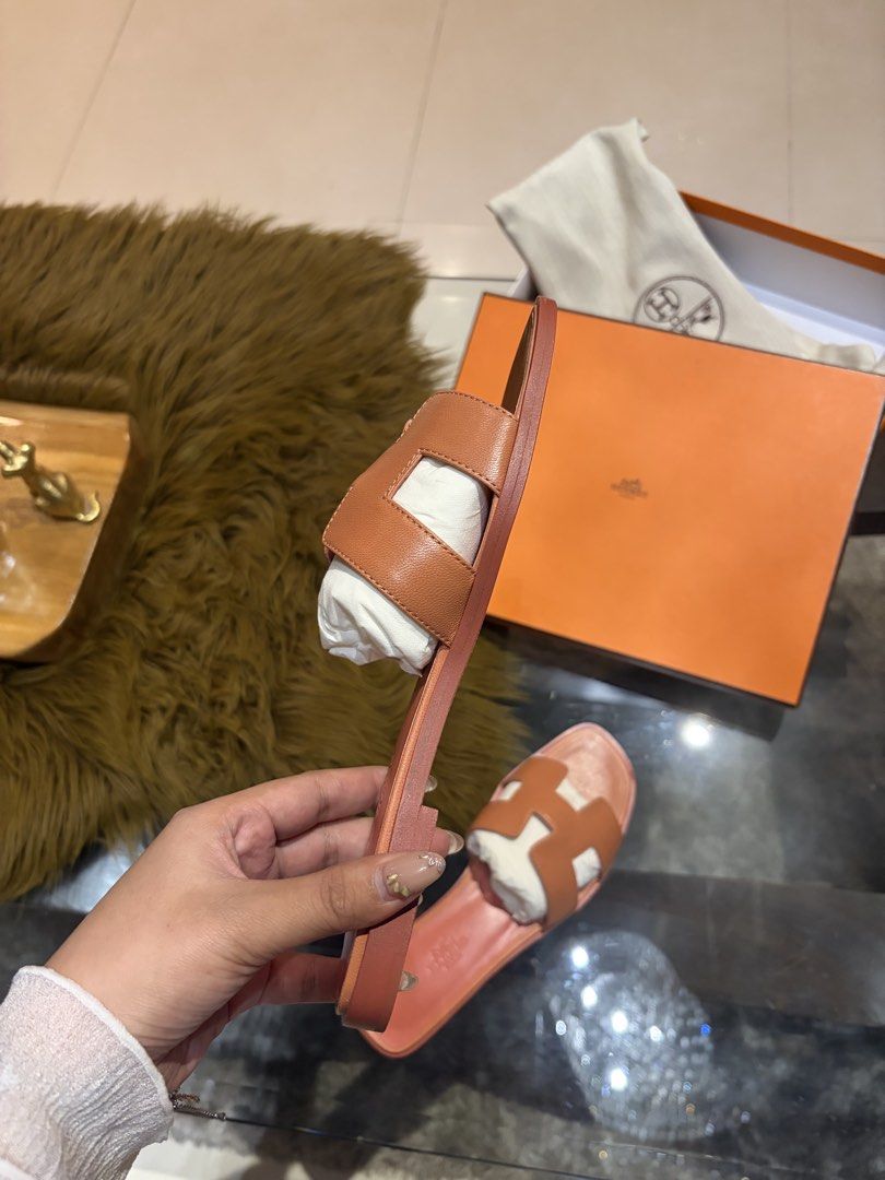 Hermes Oran Goatskin Sandals (Category: Flats & Sandals) located in Manila. Submitted by at_realty (Listing ID 1467536835, Image 2). Description: FOR SALE BRANDNEW Hermes Oran Goatskin Sandals Size: 37.5 Colour: Rouge Blush Complete with box and dust bag Selling it low. PM! PM! .