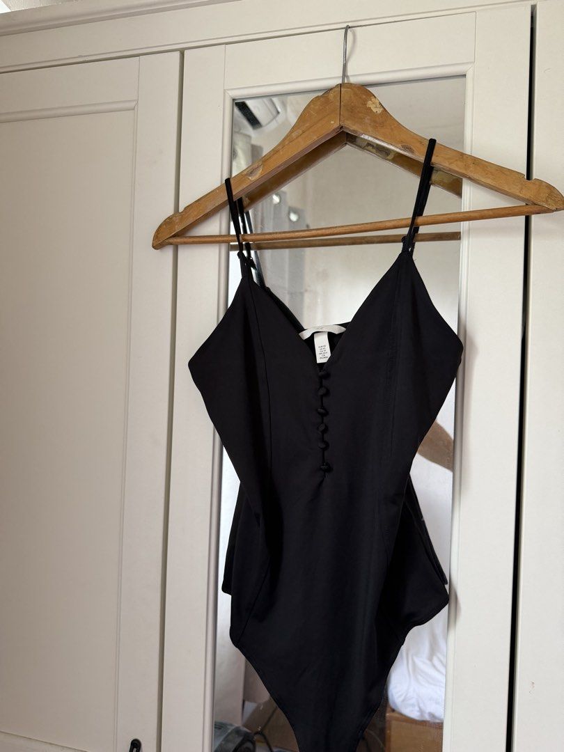H&M Black Button-Front Bodysuit XS (Category: Blouses) located in General Trias. Submitted by matchadeclutters (Listing ID 1467416913, Image 2). Description: .
