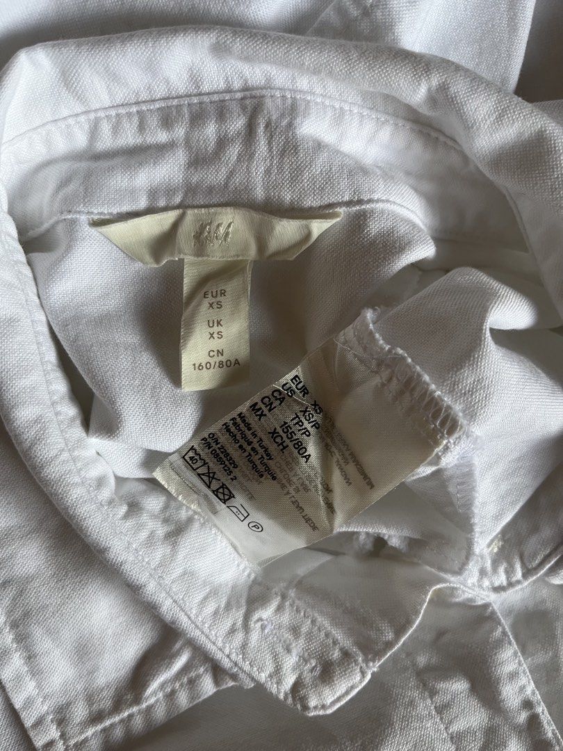 H&M White Button-Up Long Sleeve Shirt (Category: Longsleeves) located in Tandag. Submitted by maryarlale42144 (Listing ID 1467367705, Image 3). Description: LIKE NEW LARGE.