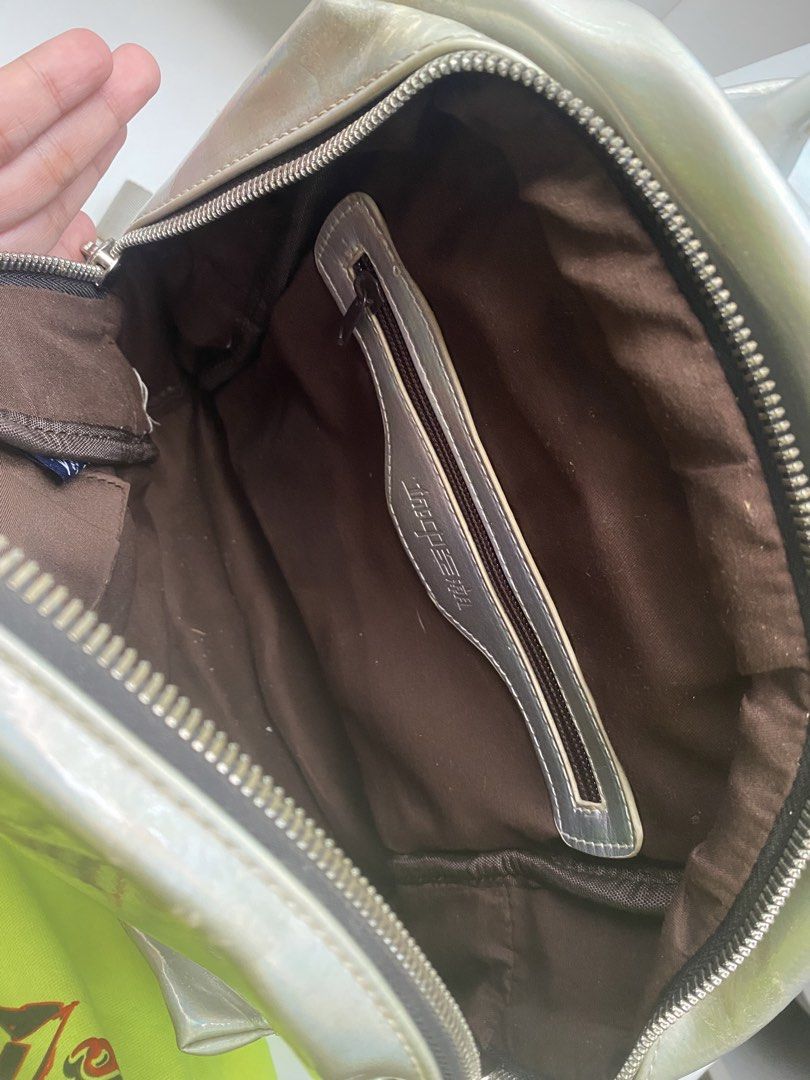 Hologram Mini Backpack (Category: Backpacks) located in Iloilo. Submitted by chelseyywz (Listing ID 1467436210, Image 3). Description: Needs proper cleaning, matagal nakatambak lang sa closet hehe. -My ipad can fit in -Please see the visible stains -Working all zippers .
