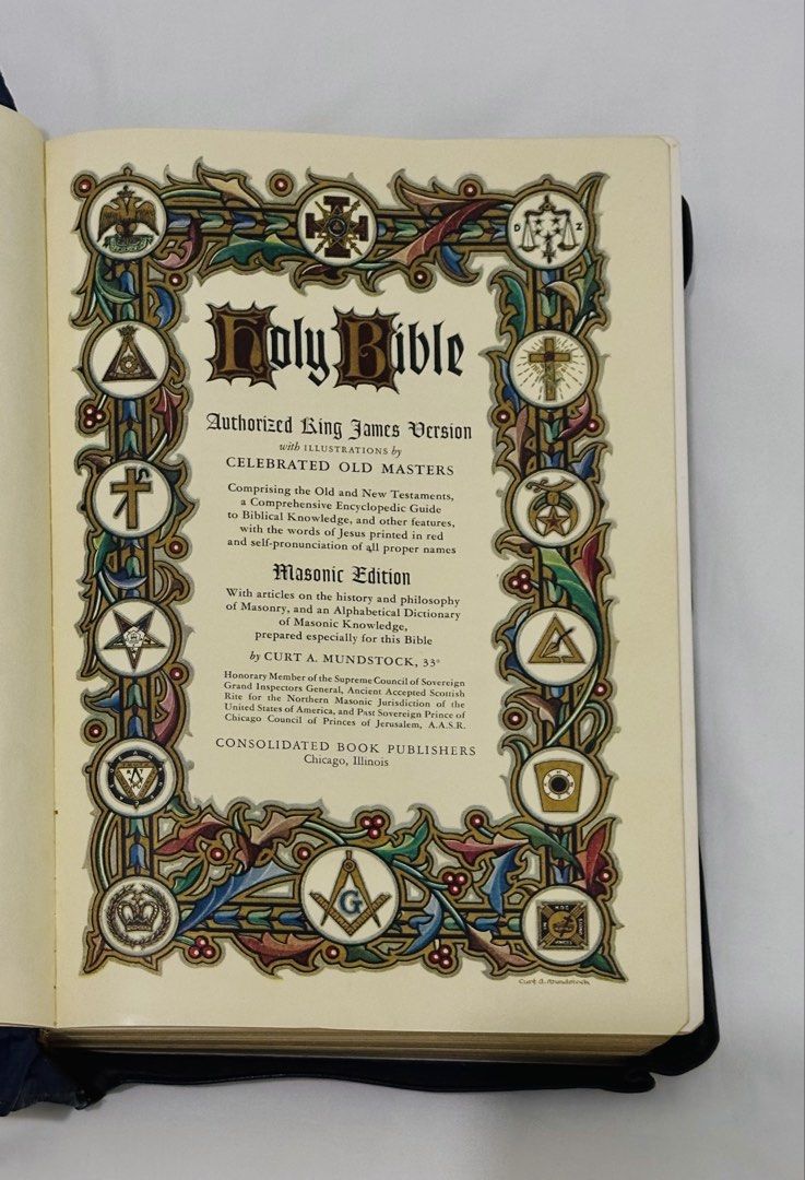 Holy Bible Authorized King James Version Masonic Edition (Category: Religion Books) located in Rodriguez. Submitted by KuyaEl09 (Listing ID 1467589743, Image 3). Description: Holy Bible Masonic Edition of the King James Version (KJV) Holy Bible Curt A. Mundstock Cover Design: Embossed blue faux-leather or genuine leather with a decorative gold-foil border surrounding the central Square and Compasses emblem, the words "HOLY BIBLE," and twelve surr