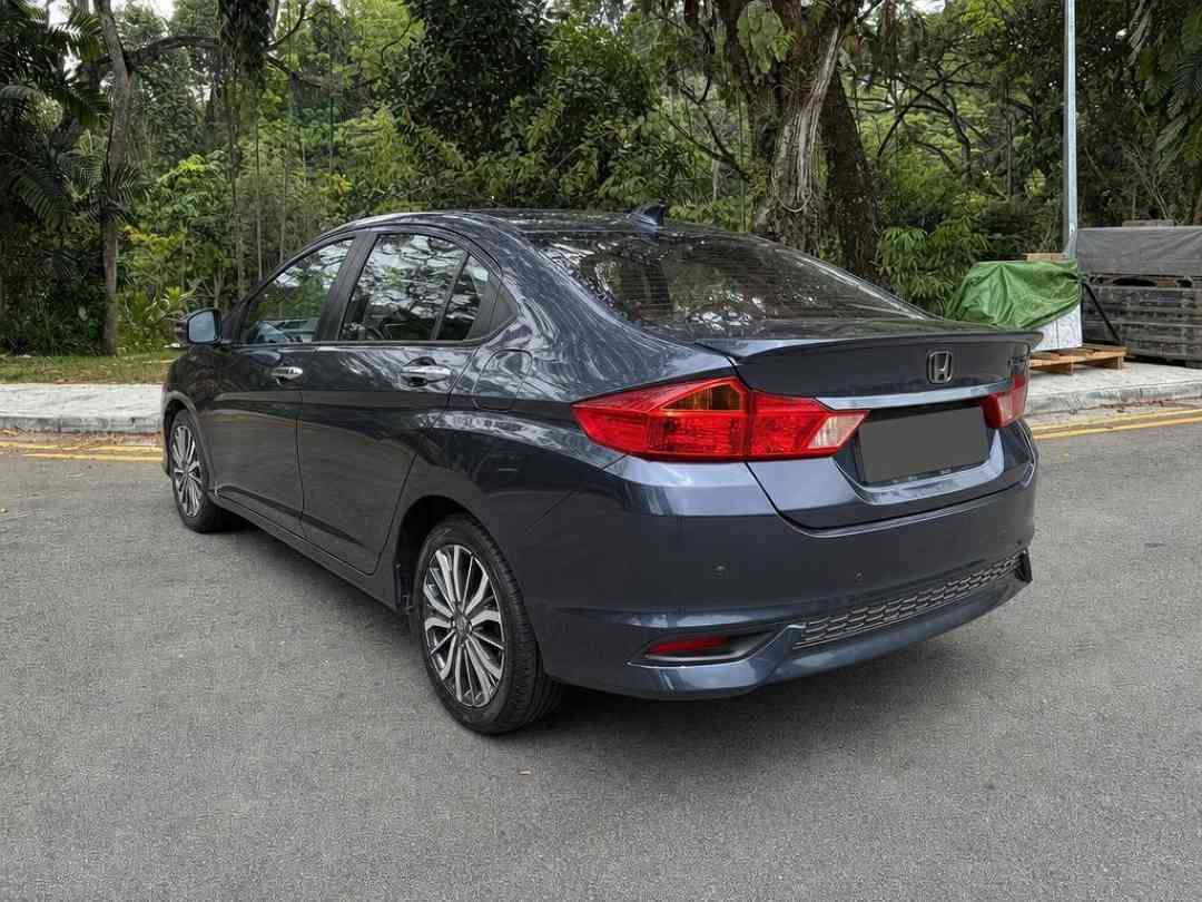 Honda City 1.5 SV (A) (Category: Used Cars) located in Singapore. Submitted by carousell_certified_partners (Listing ID 1467532535, Image 2). Description: 1 owner. Maybe the compact sedan with the best legroom in the market. Extremely responsive drive. Powerful yet fuel efficient. Easy to maintain with no unnecessary tech components. A simple and reliable car. Assurance guaranteed. Dont miss this beautiful unit. Contact us to find out more today!