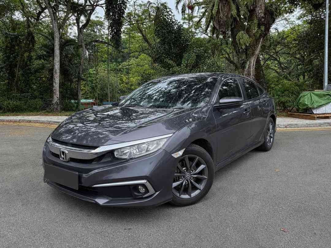 Honda Civic 1.6 i-VTEC (A) (Category: Used Cars) located in Singapore. Submitted by carousell_certified_partners (Listing ID 1467532789, Image 1). Description: Low mileage, just done servicing at agent. stylish and reliable Honda Civic 1.6a vti finished in sleek black exterior. Smooth driving experience paired with excellent fuel efficiency makes it a perfect daily drive. Well maintained unit with clean interior and sporty styling. Reliable Japan