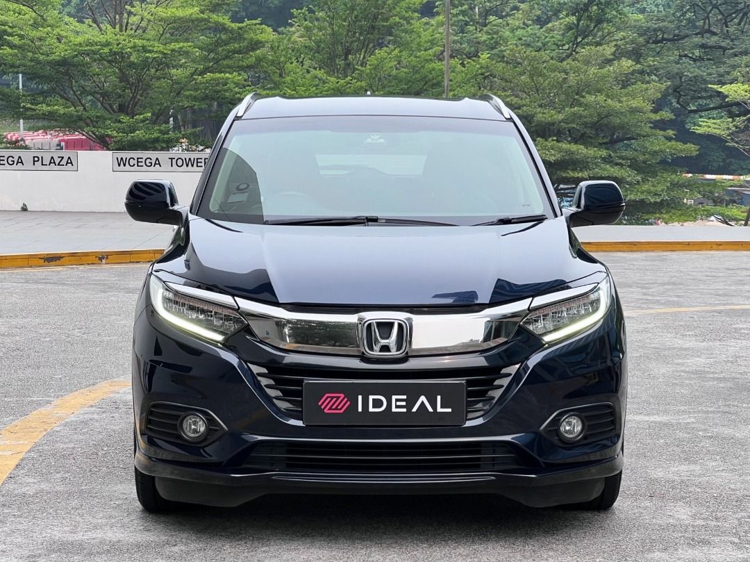 Honda HR-V 1.5 LX (A) (Category: Used Cars) located in Singapore. Submitted by idealauto (Listing ID 1467537805, Image 2). Description: Features 1.5L reliable Earth Dreams DOHC engine, 128bhp, CVT trans, ABS, airbags, TRC/cruise control, keyless entry/start/stop, auto HID headlight, econ mode. Accessories Sports rims, leather seats, factory fitted audio system with reverse camera and sensors, retractable side mirrors, front/rear recording cameras