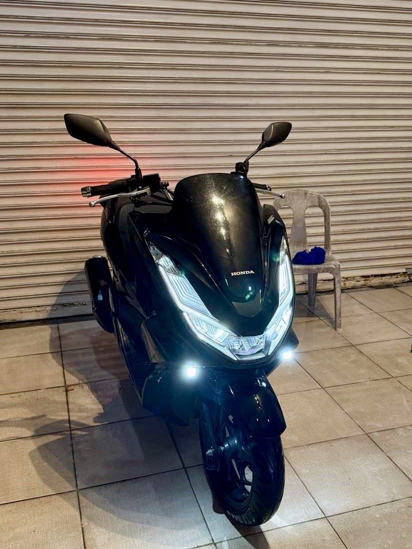 Honda PCX 160 ABS (Category: Motorbikes for Sale) located in Subic. Submitted by calliopekayin (Listing ID 1467573070, Image 2). Description: FOR SALE: Honda PCX 160 ABS 🛵 💵: ₱85,000 (negotiable) 📌 Details: * 2021 model * All stock * 15,xxx km mileage * ABS variant * With Lumina Pro MDL * Fresh change oil (2026) * Brand-new battery (October 2026) * Newly replaced steering bearing * Belt replaced in 2025 * Registered until January 2027 📌 Issue
