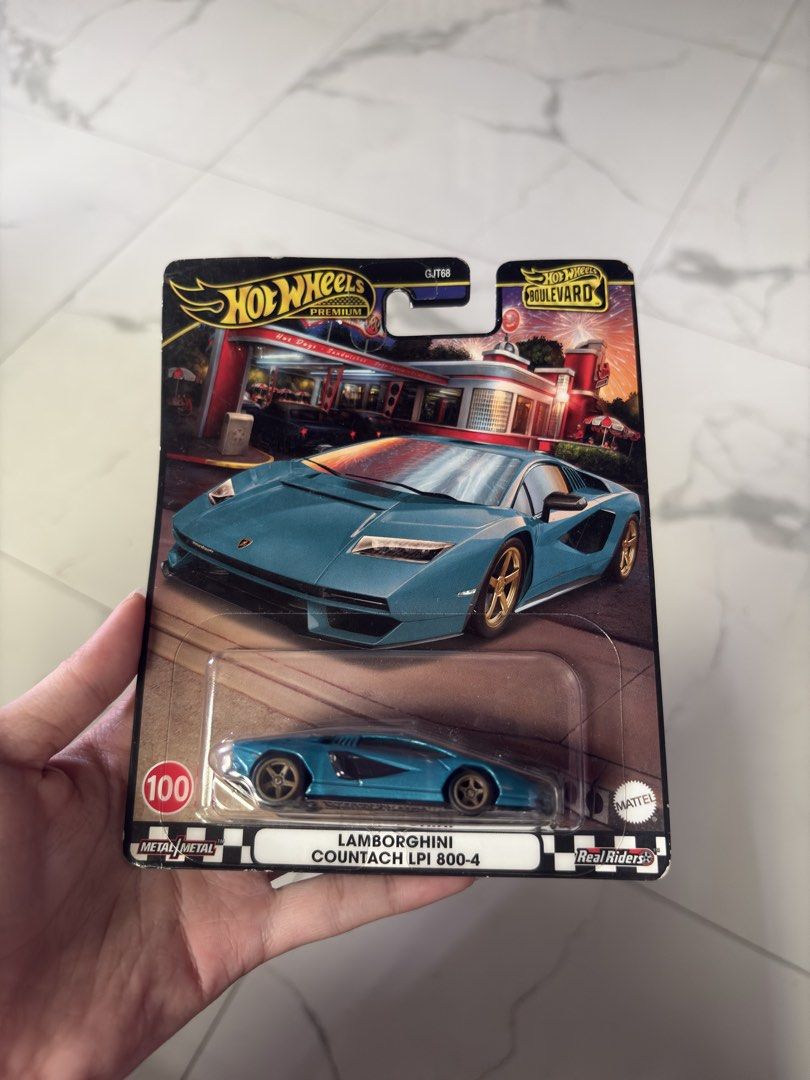 Hot Wheels Boulevard Lamborghini Countach LPI 800-4 (Category: Vehicle & Diecast Models) located in Manila. Submitted by izzmya (Listing ID 1467416479, Image 1). Description: - Brand: Hot Wheels Premium Boulevard - Model: Lamborghini Countach LPI 800-4 - Color: Metallic Blue - Features: Metal body construction and Real Riders rubber tires - Condition: Brand new, unopened in original blister card - Perfect for die-cast collectors and Lamborghini f