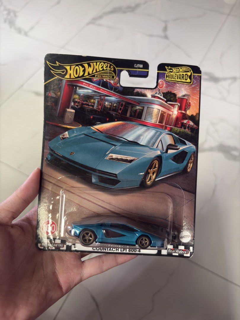 Hot Wheels Boulevard Lamborghini Countach LPI 800-4 (Category: Vehicle & Diecast Models) located in Manila. Submitted by izzmya (Listing ID 1467416479, Image 2). Description: - Brand: Hot Wheels Premium Boulevard - Model: Lamborghini Countach LPI 800-4 - Color: Metallic Blue - Features: Metal body construction and Real Riders rubber tires - Condition: Brand new, unopened in original blister card - Perfect for die-cast collectors and Lamborghini f