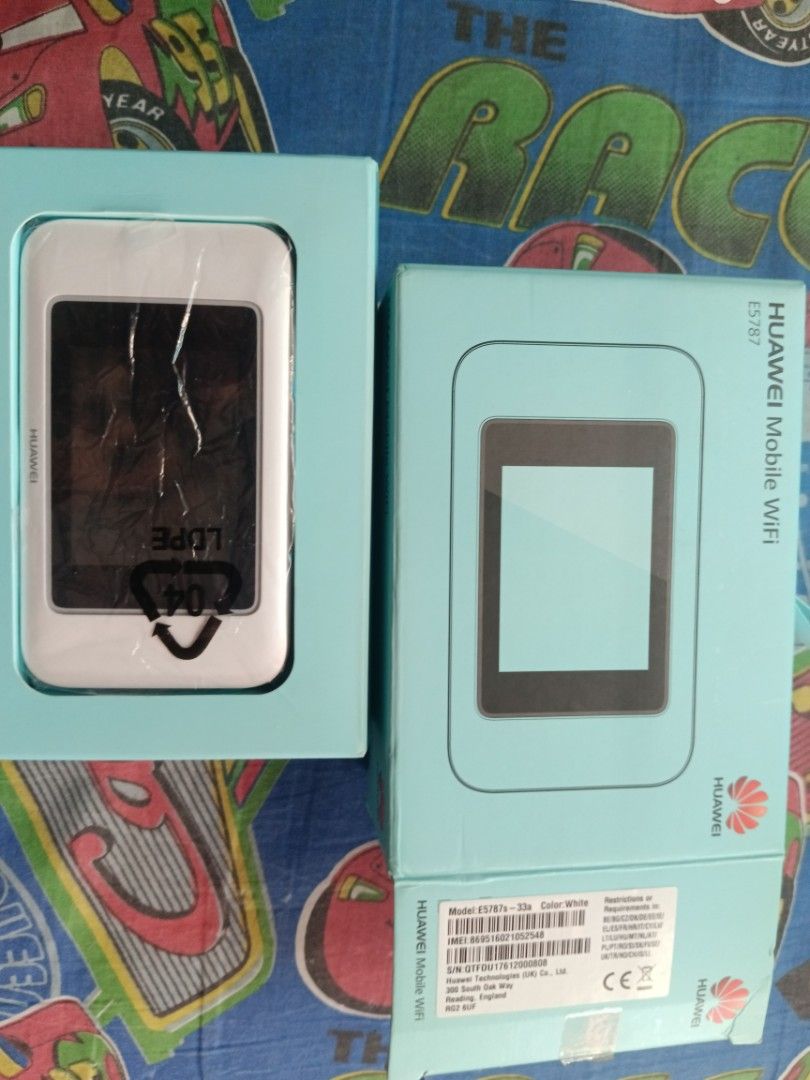 Huawei E5787 Mobile WiFi Hotspot Router (Category: Networking) located in Cavite. Submitted by navias (Listing ID 1466643055, Image 1). Description: - Model: Huawei E5787s-33a Mobile WiFi Hotspot (White) - Condition: Unlocked, works with any standard SIM card - Features: Compact design with built-in screen and handy carrying strap - Perfect for: Travel, remote work, or reliable backup internet - Convenient: Battery compartment includes exact mode