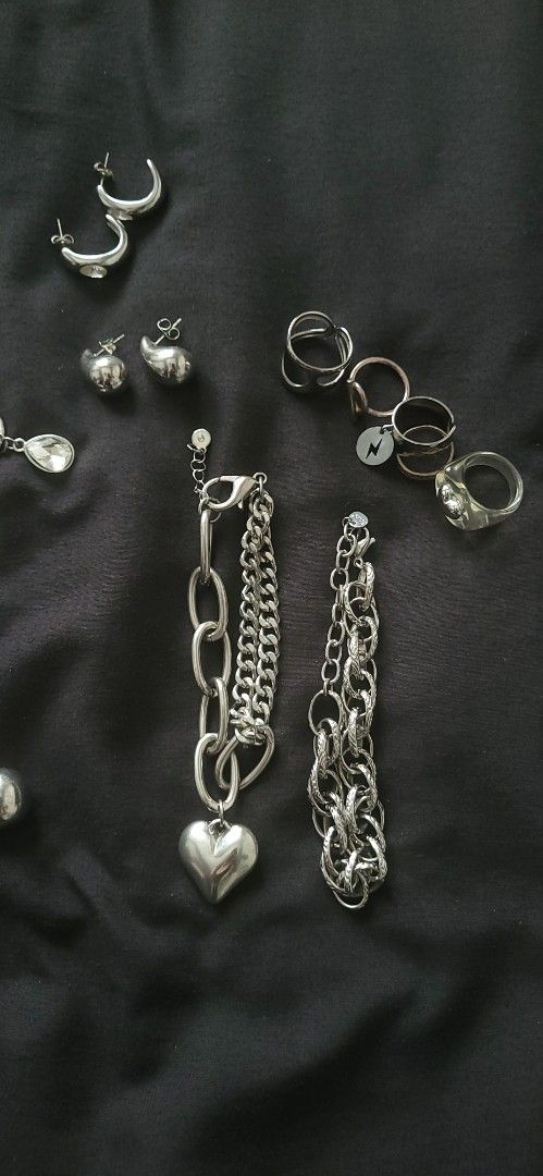 Huge bundle jewelry stainless steel silver (Category: Body Jewelry) located in Makati City. Submitted by lise_ (Listing ID 1467393292, Image 2). Description: ☆ Huge bundle of stainless steel silver jewelry ☆ Sold as a set Lalamove only or meet up at Glorietta Makati #jewelry #silver #stainlesssteel #bundle #set #elegant #y2k #acubi.