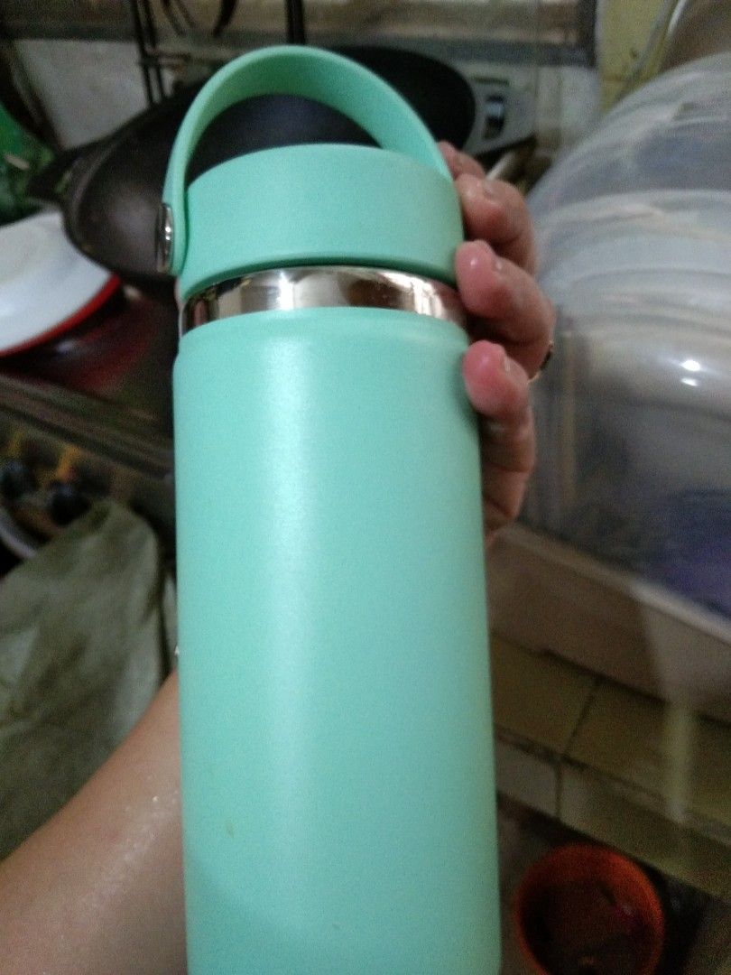 Hydro Flask Mint Green Water Bottle with Handle (Category: Water Bottles & Tumblers) located in Quezon City. Submitted by eidorableshop (Listing ID 1467365203, Image 3). Description: - Authentic Hydro Flask water bottle in a trendy mint green shade - Durable insulated stainless steel body keeps drinks hot or cold for hours - Convenient carrying handle integrated into the lid for easy portability - Standard size designed to fit most car cup holder
