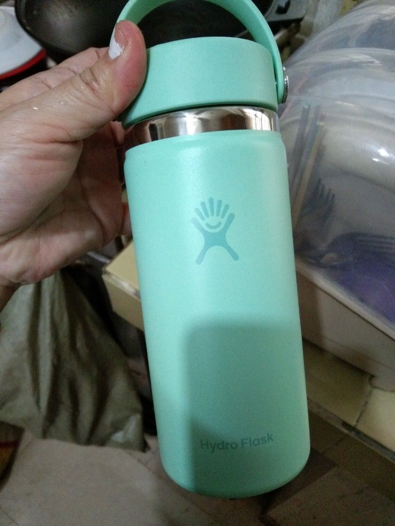Hydro Flask Mint Green Water Bottle with Handle (Category: Water Bottles & Tumblers) located in Quezon City. Submitted by eidorableshop (Listing ID 1467365203, Image 1). Description: - Authentic Hydro Flask water bottle in a trendy mint green shade - Durable insulated stainless steel body keeps drinks hot or cold for hours - Convenient carrying handle integrated into the lid for easy portability - Standard size designed to fit most car cup holder
