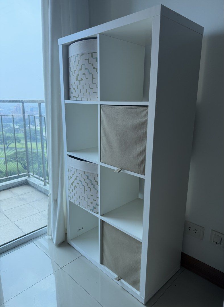 IKEA Kallax Shelf w/ storage boxes (Category: Shelves, Cabinets & Racks) located in Manila. Submitted by r_trisha (Listing ID 1467496998, Image 3). Description: Original Price: ₱4999 (w/o storage boxes) RFS: moving out Pick up c/o buyer Negotiable | message for further details .