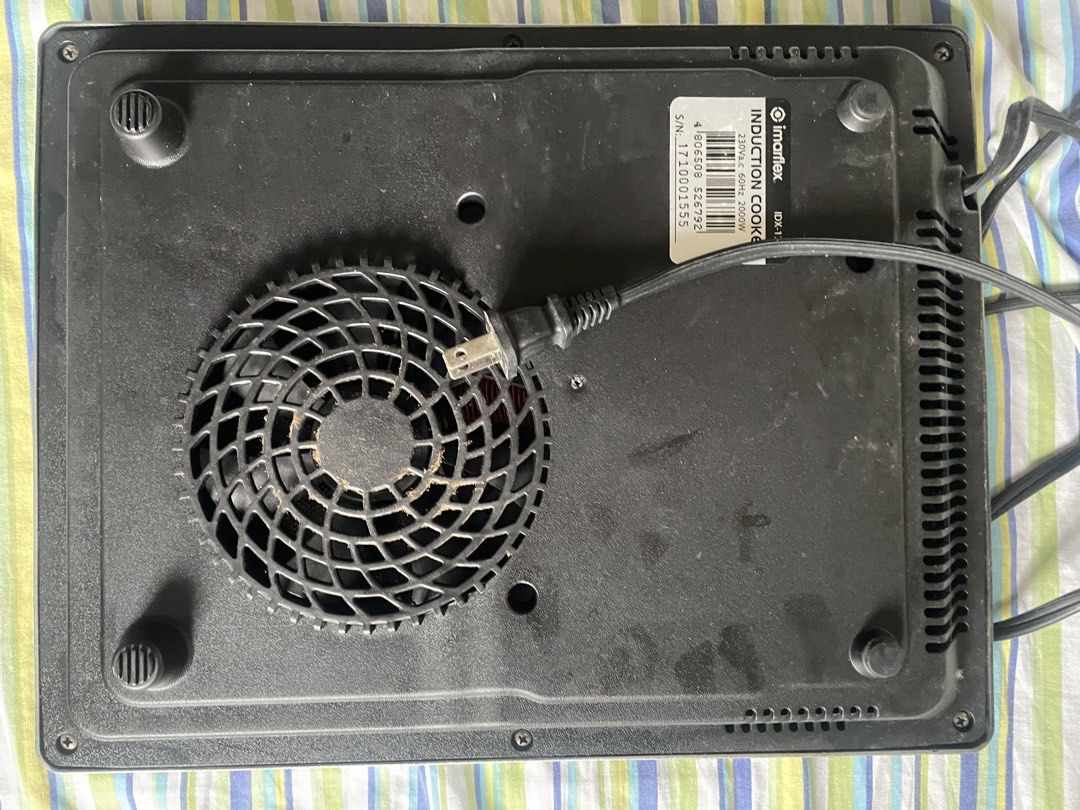 Imarflex IDX-1750T Induction Cooker (Category: Cookers) located in Cebu City. Submitted by modelrunway (Listing ID 1467434527, Image 2). Description: - Brand/Model: Imarflex IDX-1750T Induction Cooker - Power: 230V, 60Hz, 2000W with standard two-prong plug - Features: Touch-sensitive control panel with presets for hot pot, stir-fry, soup, porridge, milk, steam, warm, and roast - Capacity: Accommodates up to 24cm pot size - Condition: Used with vi