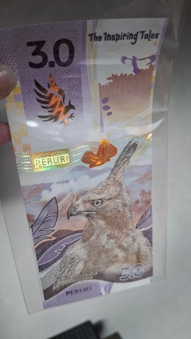 Indonesia Rupiah Test Note 3.0 - Javan Hawk Eagle (Category: Currency) located in Quezon City. Submitted by arkiv.ph (Listing ID 1467469573, Image 2). Description: Indonesia Test Note 3.0 Peruri The Inspiring Tales series. Features Javan Hawk Eagle on the front and Statue of Wisnu Kencana Garuda Story on the back. Holographic security strips and serial number AJ0006817 included. Stored inside a protective plastic sleeve. Clean condition, zero fol