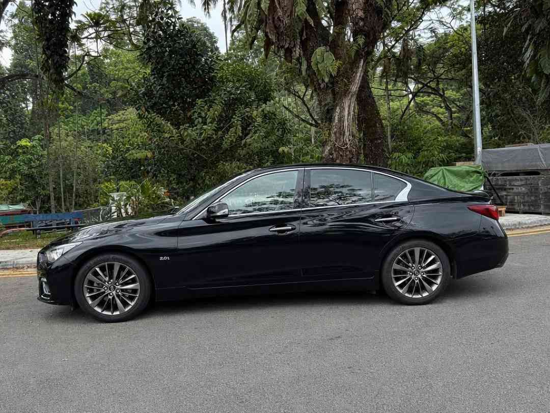 Infiniti Q50 2.0T Luxe (A) (Category: Used Cars) located in Singapore. Submitted by carousell_certified_partners (Listing ID 1467531602, Image 2). Description: Showroom condition, flawless paintwork and clean interior! Immaculate condition. Timely serviced and well taken care by previous owner, Accident free, Trade ins most welcome. High/full loan options available. $0 downpayment/driveaway possible. Contact us to arrange a viewing. Features: 2.0