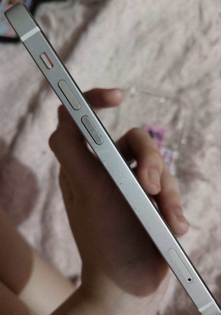 Iphone 12 128gb (Category: iPhone 12 Series) located in Manila. Submitted by _.clementine (Listing ID 1467559386, Image 3). Description: IPHONE 12 128GB FOR SALE! 🤍 PHP 7,500 - lady owned - makinis - 67% Battery Health (original) makunat pa - IOS version 18.5 - no SIM Restrictions - flash working - true tone & face ID working - all buttons working - no replacements - safe to reset or update honest issue : shakey camera and hindi nag fofocus yung
