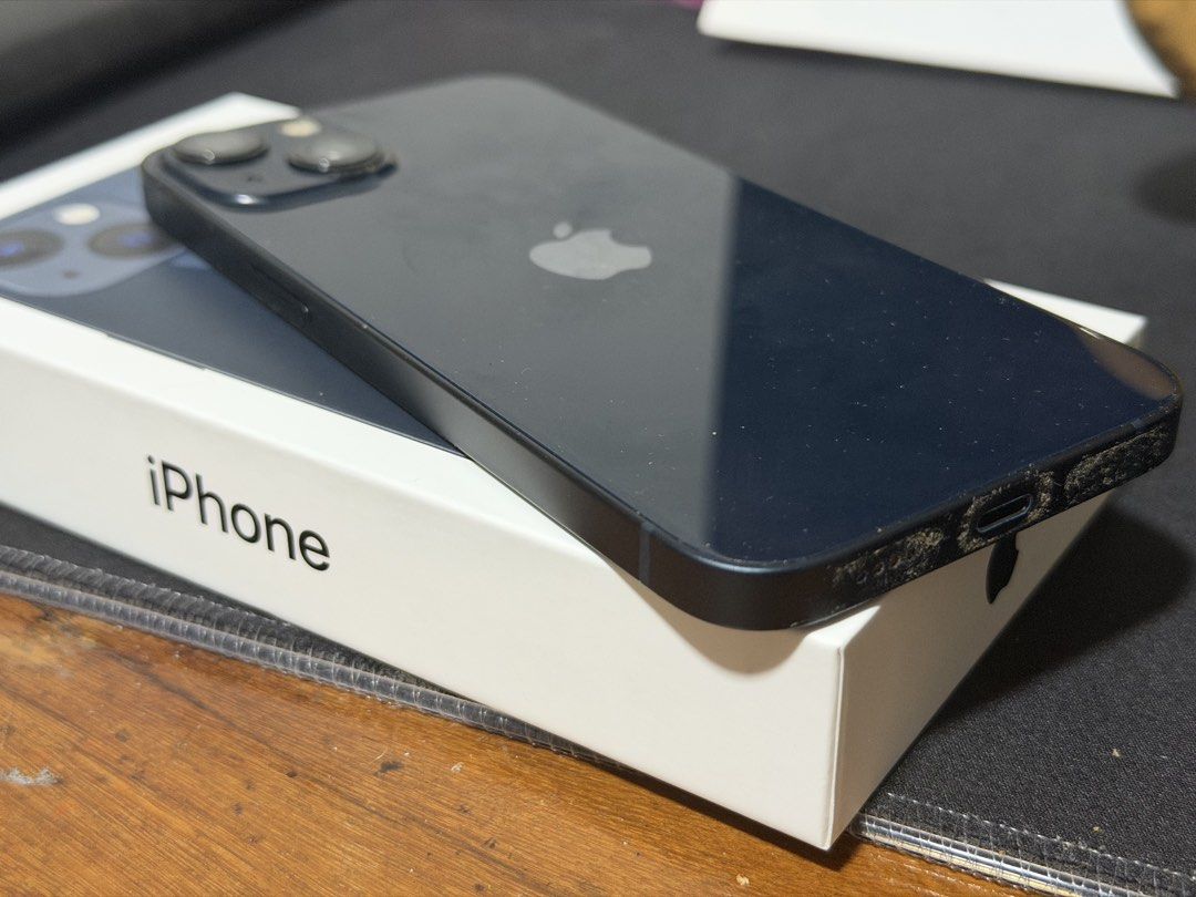 iPhone 13 (Category: iPhone 13 Series) located in Paranaque City. Submitted by epicwater_cf0364 (Listing ID 1467470286, Image 1). Description: iphone 13 Midnight 128gb with clear case with complete cable and box.