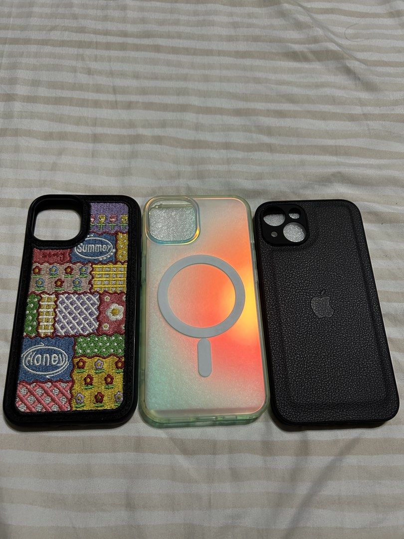 iPhone 14 cases (Category: Cases & Sleeves) located in Cavite. Submitted by mgmm17 (Listing ID 1467498107, Image 1). Description: 3 for 250 :) All in good condition STRONG MAGSAFE yung nasa middle May free one case na may white marks sa sides, yun lang flaws .