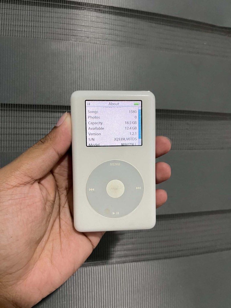 Ipod classic 4th gen (photo) (Category: Portable Music Players) located in Quezon City. Submitted by all_about_retro (Listing ID 1467501259, Image 1). Description: Ipod classic 4th gen (photo) 20gb Good lcd Good clickwheel Good battery 5hrs playing music Unit only No issue Pickup.