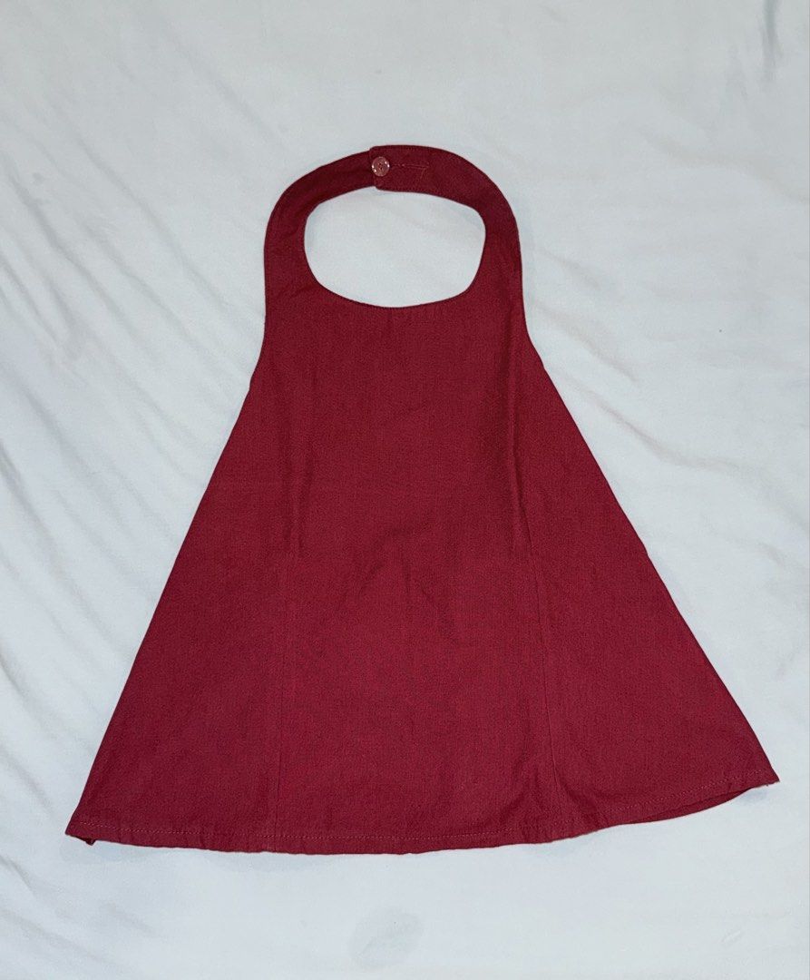 ISAY Maroon Halter Top Cotton Linen (Category: Sleeveless) located in Las Pinas. Submitted by kathhsantoss (Listing ID 1467480540, Image 1). Description: - Used only once - Measurements: Width: 15-18in Length: 16in - Material: Breathable cotton linen fabric - Design: Halter top with button closure at the neck - Fit: Garterized back for added comfort with a flare style body.