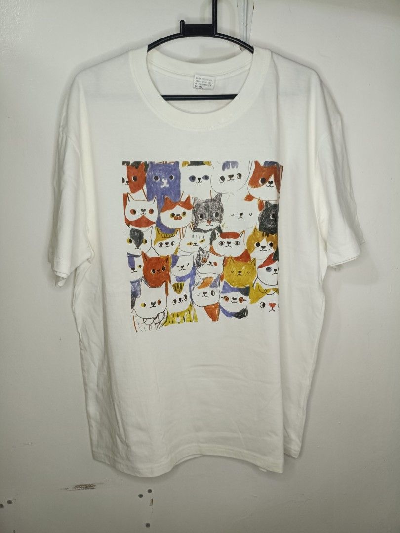 Ivory Graphic Print T-Shirt (Category: Shirts) located in Santa Maria. Submitted by abclosetph (Listing ID 1467427315, Image 1). Description: medida size! bust: 44 length: 27.5 - unused, need wash) - issue is stated - color may vary due to lighting - manage your expectations, these are preloved items..