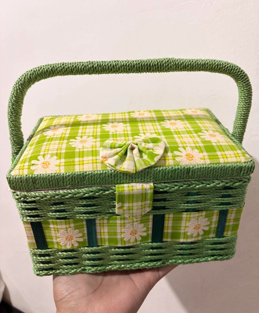 Japan Green Plaid Daisy Basket Storage Box (Category: Storage Boxes & Baskets) located in Cavite. Submitted by l1ttlelulu (Listing ID 1467511051, Image 1). Description: - Adorable green plaid design with a white daisy pattern and front bow clasp - Sturdy woven top handle for easy carrying - Dark green interior lining with delicate lace trim - Built-in pincushion on the inside lid - Handy elastic pockets for organizing small sewing and craft suppl