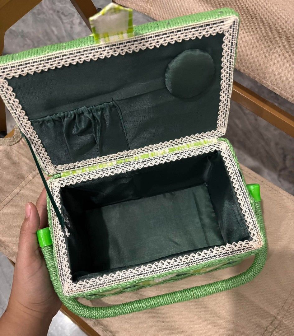 Japan Green Plaid Daisy Basket Storage Box (Category: Storage Boxes & Baskets) located in Cavite. Submitted by l1ttlelulu (Listing ID 1467511051, Image 2). Description: - Adorable green plaid design with a white daisy pattern and front bow clasp - Sturdy woven top handle for easy carrying - Dark green interior lining with delicate lace trim - Built-in pincushion on the inside lid - Handy elastic pockets for organizing small sewing and craft suppl