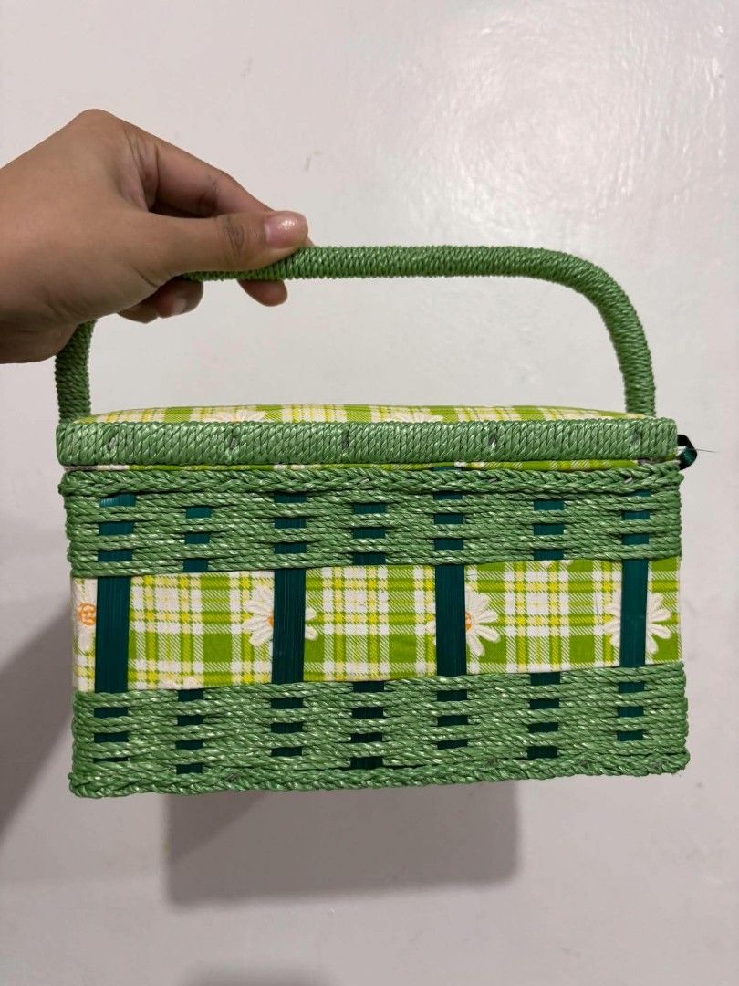 Japan Green Plaid Daisy Basket Storage Box (Category: Storage Boxes & Baskets) located in Cavite. Submitted by l1ttlelulu (Listing ID 1467511051, Image 3). Description: - Adorable green plaid design with a white daisy pattern and front bow clasp - Sturdy woven top handle for easy carrying - Dark green interior lining with delicate lace trim - Built-in pincushion on the inside lid - Handy elastic pockets for organizing small sewing and craft suppl