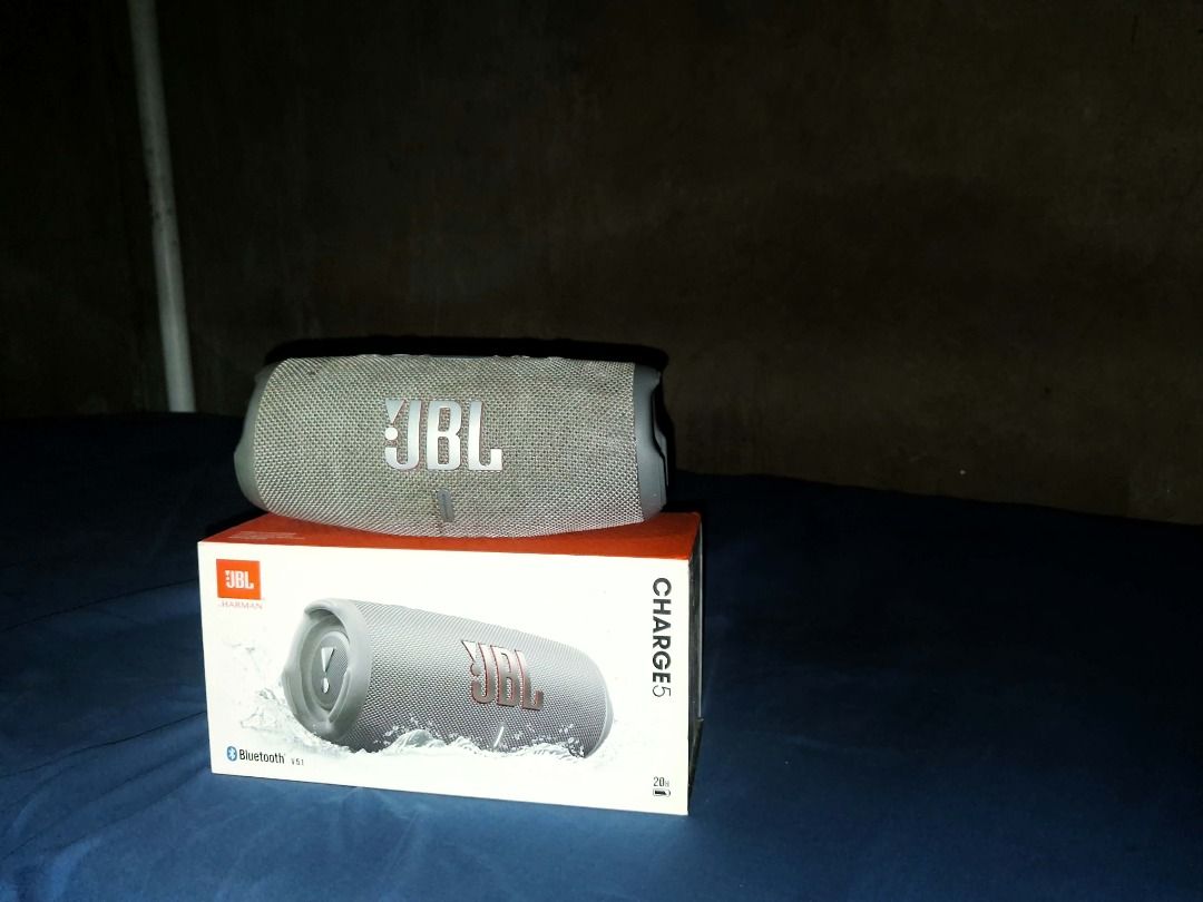 JBL Charge Portable Bluetooth Speaker with Original Box (Category: Soundbars, Speakers & Amplifiers) located in Lapu Lapu. Submitted by ngujoced9450399 (Listing ID 1467481824, Image 1). Description: - Model: JBL Portable Bluetooth Speaker - Color: Stylish grey fabric mesh - Sound: Powerful audio with heavy bass - Durability: Outdoor-ready with a waterproof build - Battery: Holds a great charge - Inclusions: Original retail box included - Conditio