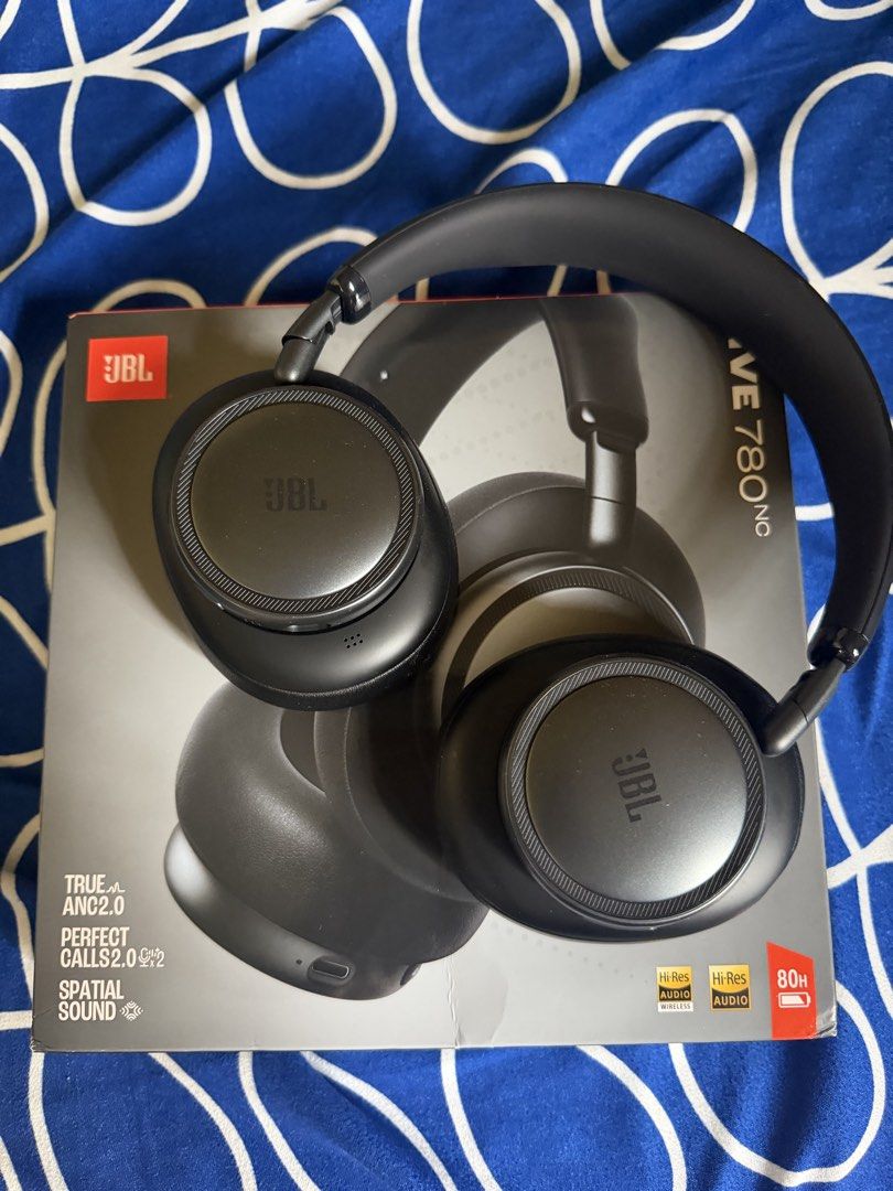 JBL Live 780NC Wireless Headphones (Category: Headphones & Headsets) located in Dasmarinas. Submitted by matteo_luxe (Listing ID 1467364658, Image 1). Description: - Model: JBL Live 780NC Wireless Over-Ear Headphones - Color: Black - True Adaptive Noise Cancelling 2.0 & Spatial Sound - Massive up to 80 hours battery life - -Res Audio Wireless Certified - Condition: Comes with original box No issue Bought in orange app for 10,500 Selling low week 