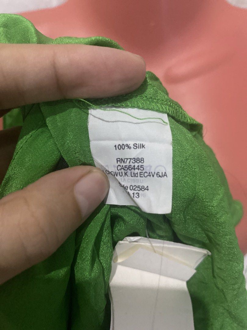 j.crew Factory Silk Green Button-Down Blouse (Category: Blouses) located in Pulupandan. Submitted by pointyspoon (Listing ID 1467466525, Image 3). Description: - Brand: J.Crew Factory - Color: Bright Green - Size: XS - Material: 100% Silk - Condition: Brand new with original store tags attached - Features: Long sleeves, pointed collar, front button closure, two chest pockets.