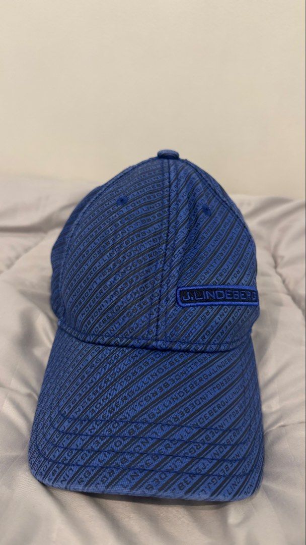 j.lindeberg Blue Logo Print Baseball Cap (Category: Caps & Hats) located in Manila. Submitted by vdoozy (Listing ID 1467435509, Image 1). Description: J.Lindeberg Golf Cap Adjustable metal strap closure at the back (One size fits most adults) Location: Katipunan, Quezon City.