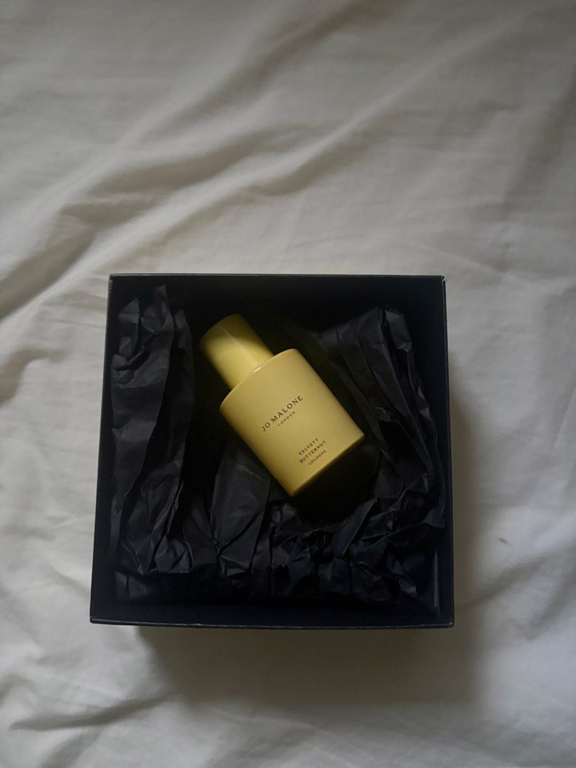 Jo Malone Velvety Butternut Cologne with Box (Category: Fragrance & Deodorants) located in Legazpi City. Submitted by axljae10505 (Listing ID 1467600911, Image 3). Description: - Brand: Jo Malone London - Scent/Item: Velvety Butternut Cologne (Yellow bottle) - Condition: Brand new, unused, kept safely in storage - Packaging: Comes with original branded black and beige box with black tissue paper - Ideal for gifts or collectors.