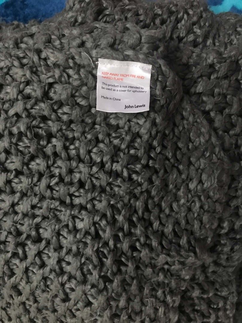 John Lewis Dark Grey Chunky Knit Throw Blanket (Category: Bedding & Towels) located in Imus. Submitted by stop_shop7 (Listing ID 1467419407, Image 1). Description: - Brand/Item: John Lewis dark grey chunky knit throw blanket - Texture: Thick, textured yarn woven throughout for a cozy look - Color: Neutral solid dark grey, fits any living room or bedroom decor - Comfort: Heavyweight style designed to keep you warm on cold nights - Condition: Clean