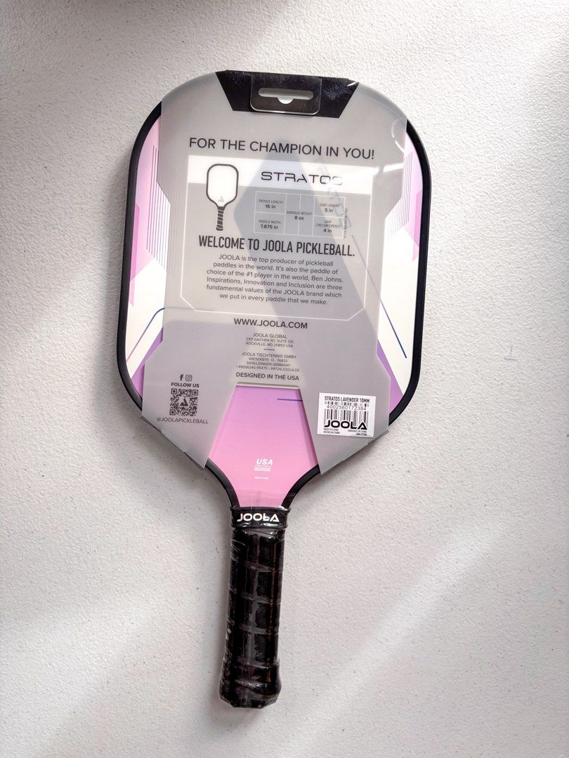 JOOLA Stratos Lavender Pickleball Paddle (Category: Racket and Ball Sports) located in Bacolor. Submitted by tishfinds_ (Listing ID 1467364227, Image 2). Description: - Brand: JOOLA Stratos - Color: Lavender - Condition: Brand new, unused with factory plastic wrap on face and handle - Core Thickness: 10mm - Dimensions: 16" length x 7.875" width - Grip: 5" length, 4" circumference - Weight: Approx. 8 oz.