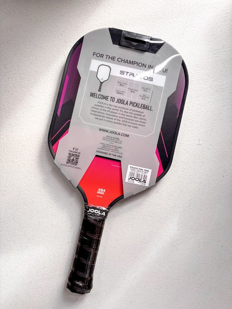 Joola Stratos Pink Pickleball Paddle (Category: Racket and Ball Sports) located in Bacolor. Submitted by tishfinds_ (Listing ID 1467364256, Image 2). Description: Bought in the US. - Brand: Joola Stratos Pink (10mm) - Condition: Brand new, unopened with plastic wrap and packaging intact - Dimensions: 16" length x 7.875" width - Weight: Avg. 8 oz - Grip: 5" length, 4" circumference - Certification: USA Pickleball approved - Authenticity: Original 