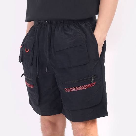 Jordan 23 Engineered Nylon Cargo Shorts Black (Category: Shorts) located in Davao. Submitted by vernoneighty4 (Listing ID 1467476805, Image 1). Description: - Authentic Jordan 23 Engineered nylon cargo shorts - Color: Black with signature red embroidered branding - Material: Lightweight crinkled fabric for all-day comfort - Waistband: Elastic with adjustable drawstring cords - Pockets: Multiple functional cargo pockets, including secure zippered 