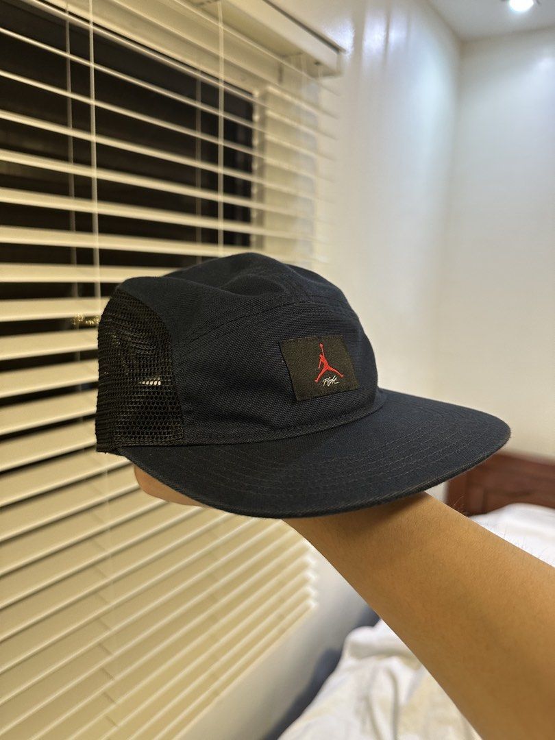 Jordan Jumpman Flight Mesh Cap (Category: Caps & Hats) located in Manila. Submitted by takao.baltazar (Listing ID 1467541823, Image 1). Description: - Color: Classic black with striking red Jumpman Flight logo patch - Design: Breathable mesh side and back panels for comfort - Fit: Adjustable strap closure in the back, Size S/M - Detail: Interior taping features the iconic "quality inspired by the greatest player ever" quote - Condition: Impeccabl