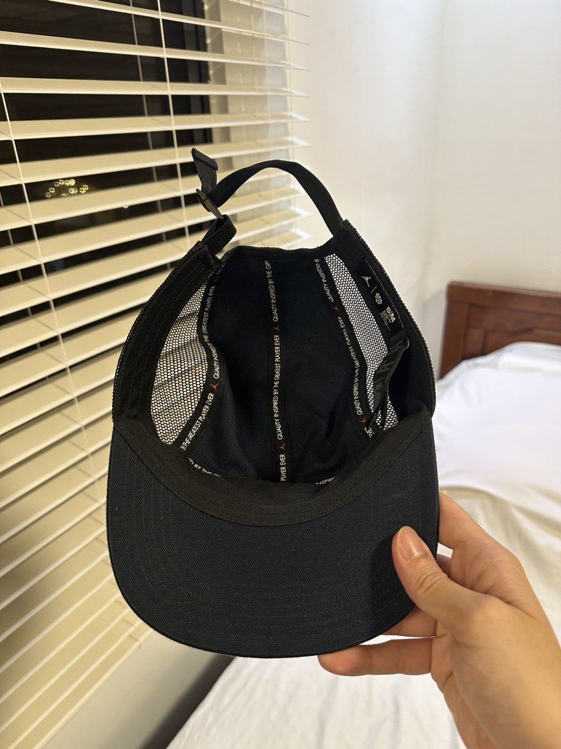 Jordan Jumpman Flight Mesh Cap (Category: Caps & Hats) located in Manila. Submitted by takao.baltazar (Listing ID 1467541823, Image 2). Description: - Color: Classic black with striking red Jumpman Flight logo patch - Design: Breathable mesh side and back panels for comfort - Fit: Adjustable strap closure in the back, Size S/M - Detail: Interior taping features the iconic "quality inspired by the greatest player ever" quote - Condition: Impeccabl