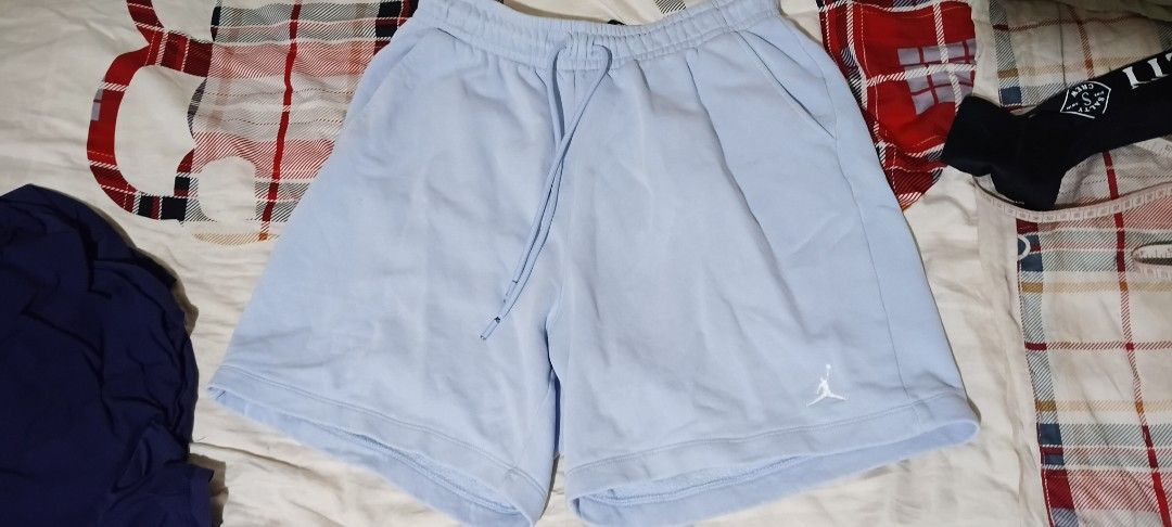Jordan Light Blue Fleece Shorts (Category: Shorts) located in San Ildefonso. Submitted by rigor32eva20161 (Listing ID 1467387582, Image 1). Description: - Brand/Style: Jordan light blue fleece shorts - Details: Embroidered Jumpman logo, elastic drawstring waistband, and deep side pockets - Material: Soft and comfortable cotton-polyester blend - Origin & Care: Made in Vietnam, machine washable -minimal fade on waistband at the back -minimal pin ho
