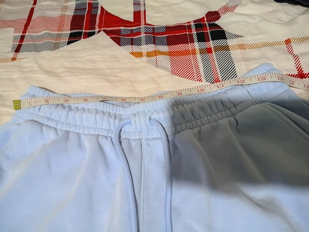 Jordan Light Blue Fleece Shorts (Category: Shorts) located in San Ildefonso. Submitted by rigor32eva20161 (Listing ID 1467387582, Image 3). Description: - Brand/Style: Jordan light blue fleece shorts - Details: Embroidered Jumpman logo, elastic drawstring waistband, and deep side pockets - Material: Soft and comfortable cotton-polyester blend - Origin & Care: Made in Vietnam, machine washable -minimal fade on waistband at the back -minimal pin ho