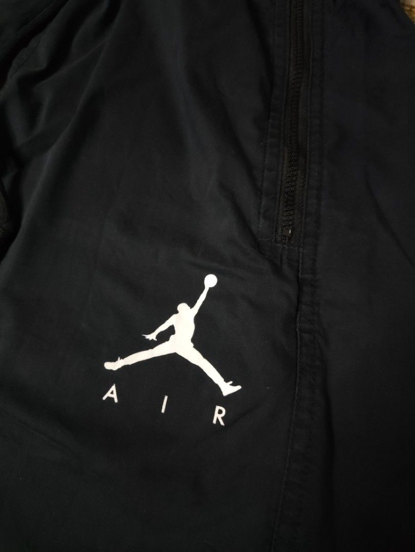 Jordan Woven Pants (Category: Joggers) located in Taguig. Submitted by althriftdailyloots94 (Listing ID 1467483520, Image 2). Description: - Authentic Jordan Air sweatpants in classic black - Size: Large (Product code: AV1841-010, Made in Vietnam) - Iconic white Jumpman logo on the left leg - Adjustable elastic waistband with drawstring - Convenient zippered side pockets to keep your items secure - Comfortable elastic ankle cuffs - Soft, premium 
