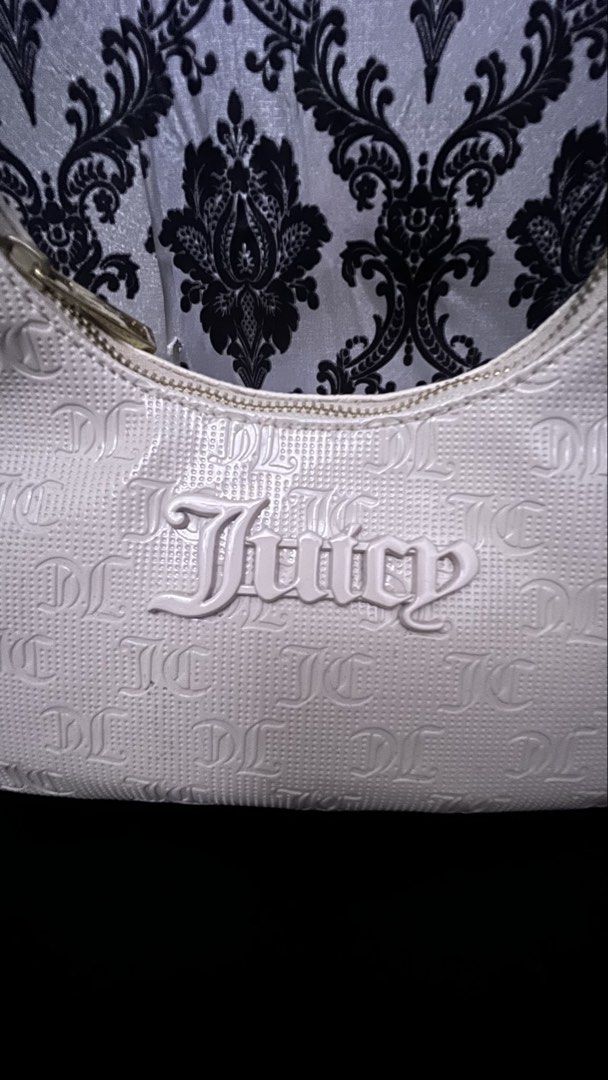 Juicy Couture White Monogram Shoulder Bag (Category: Shoulder Bags) located in Bulacan. Submitted by darkside_apparel (Listing ID 1467469574, Image 2). Description: WHITE JUICY COUTURE CROSS BODY BAG M: 1200 Mine now pay later No cancellation No Return N Refund Reminder: We are not liable on any lost or damage of parcel..