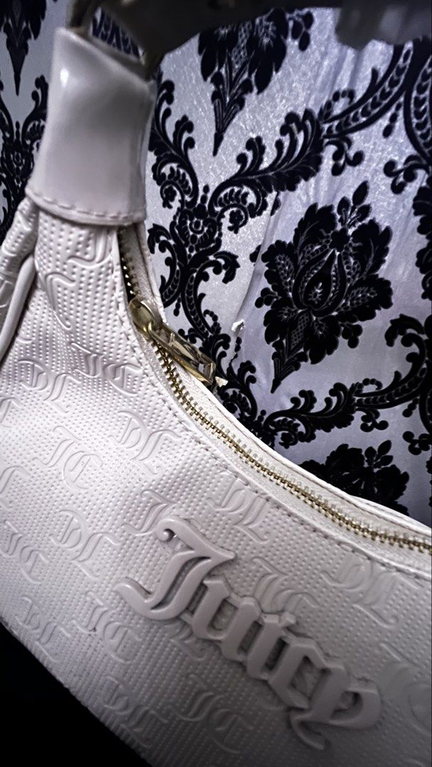 Juicy Couture White Monogram Shoulder Bag (Category: Shoulder Bags) located in Bulacan. Submitted by darkside_apparel (Listing ID 1467469574, Image 3). Description: WHITE JUICY COUTURE CROSS BODY BAG M: 1200 Mine now pay later No cancellation No Return N Refund Reminder: We are not liable on any lost or damage of parcel..