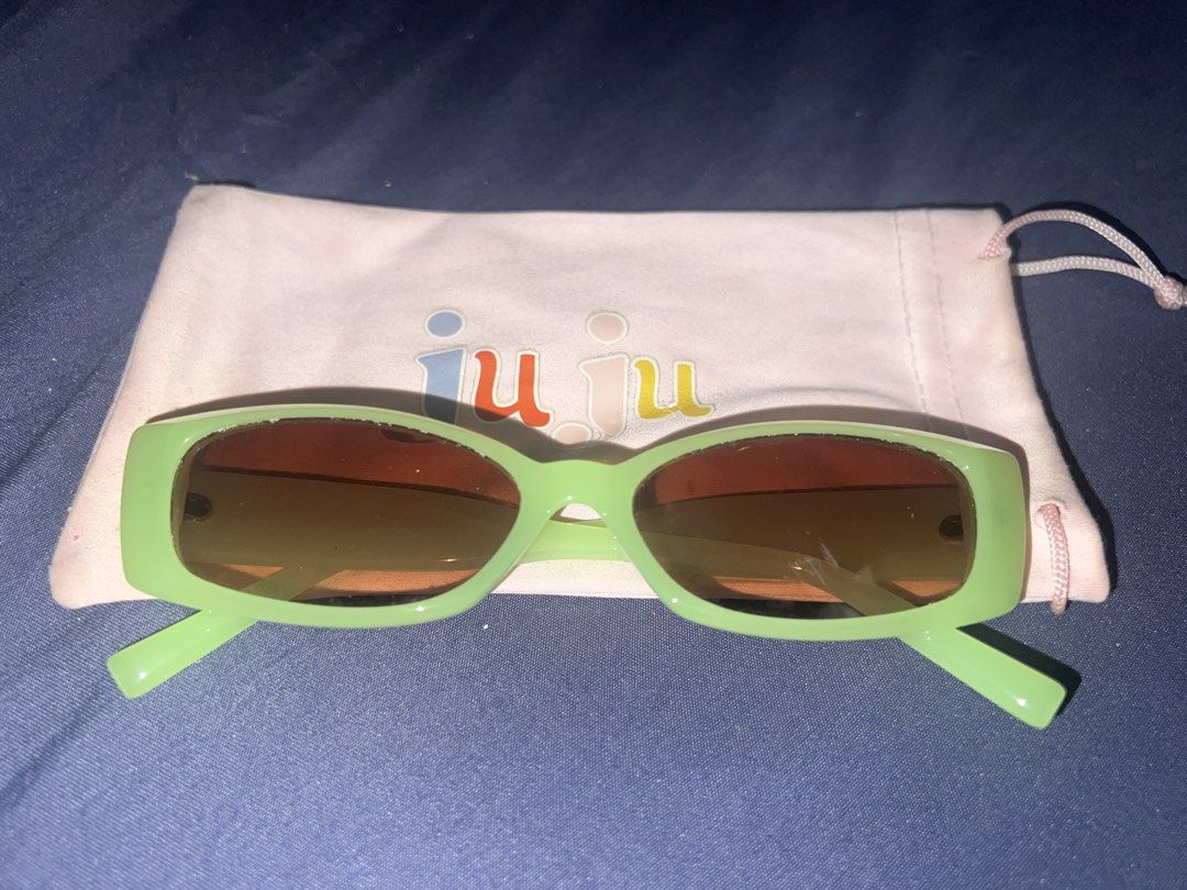 Juju Mint Green Rectangular Sunglasses with Pouch (Category: Sunglasses & Eyewear) located in Carmona. Submitted by tonette95 (Listing ID 1467452804, Image 2). Description: - Brand: Juju - Style: Retro 90s chunky rectangular frames - Color: Mint green with gradient brown lenses - Inclusion: Original branded light pink drawstring pouch - Condition: Great everyday accessory.