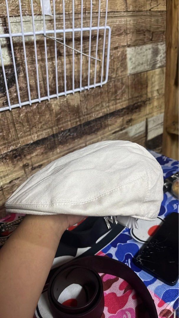 Kangol Flat Cap Cream Size S (Category: Caps & Hats) located in Impasugong. Submitted by luisterpicks (Listing ID 1467487220, Image 2). Description: - Brand: Kangol - Color: Cream - Size: Small - Details: Embroidered kangaroo logo on the back, classic structured panel design - Condition: Excellent, comes with official interior branding and care tags - Mode of Payment: GCash, BPI, or Maya - Shipping: Via J&T Express or Same-Day Delivery (Metro Man