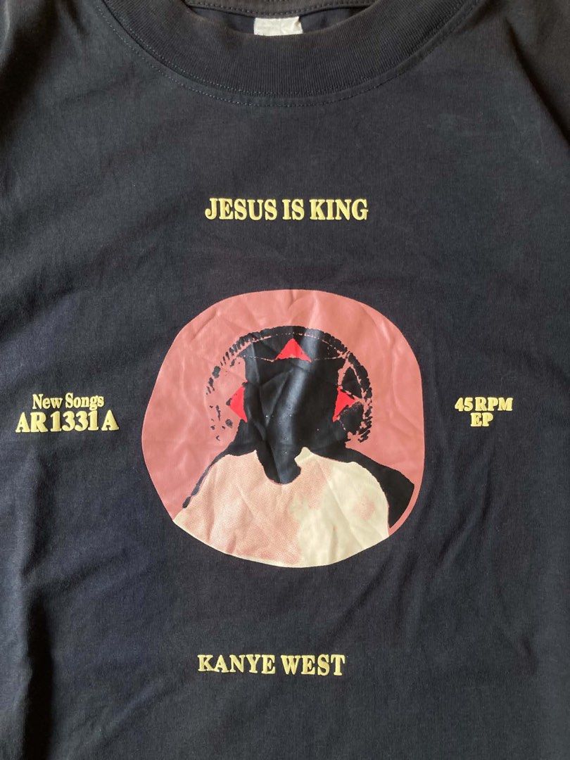 KANYE WEST (Category: Activewear) located in Lucena. Submitted by zhildaze (Listing ID 1467415759, Image 2). Description: Kanye West “Jesus is King” Tee • Features a design inspired by the Vinyl Record Format • Puff Print • Beefy Neck AUTHENTIC Size: (23W) (29L) XL Condition: 9.5/10.