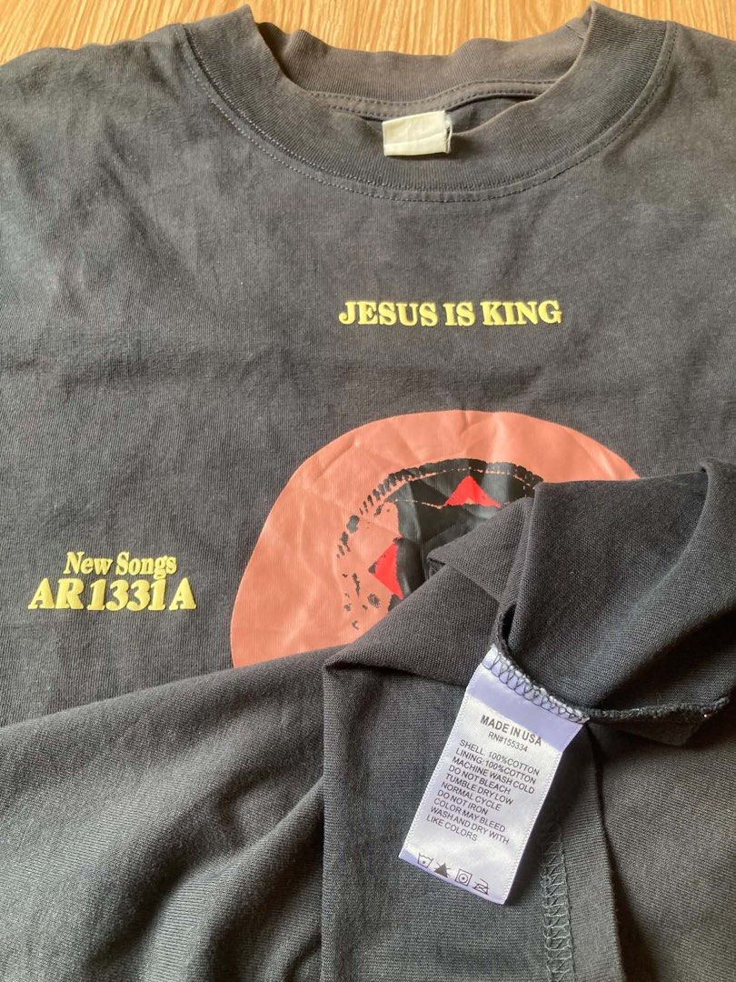 KANYE WEST (Category: Activewear) located in Lucena. Submitted by zhildaze (Listing ID 1467415759, Image 3). Description: Kanye West “Jesus is King” Tee • Features a design inspired by the Vinyl Record Format • Puff Print • Beefy Neck AUTHENTIC Size: (23W) (29L) XL Condition: 9.5/10.