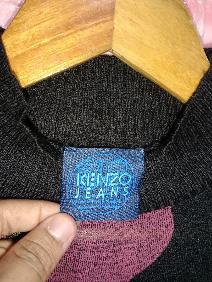 Kenzo Paris Vintage (Category: Luxury Apparel) located in Davao. Submitted by ayeeasyshop13 (Listing ID 1467544349, Image 3). Description: This item is a vintage Kenzo Jeans high-neck knitted top, a piece from the discontinued, denim-focused diffusion line launched by KENZO in the late 1980s and 1990s. As new condition (For Women's) Fit to xs to small (knitted) Dimension 18/22 700 + SF.